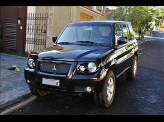 Imagem 3 de 6 de Farol Pajero Sport / Tr4 C/lente Policarbonato - Iam - Par