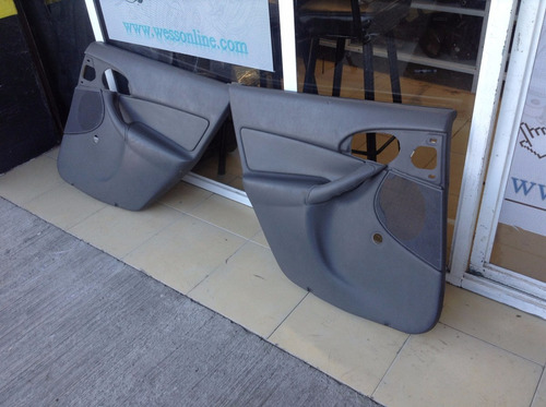 Tapas De Puertas Ford Focus Sedan Mod: 00-04 (precio X C/u)