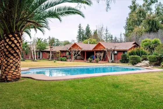 Parcela Acogedora Con 2 Casas Uf60 
