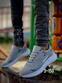 Tenis nike grises hombre hotsell