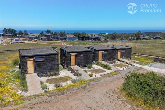 Parcela Con Inversión Turística De 4 Cabañas En Pichilemu