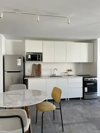 Departamento En Venta Amoblado En General Paz De 2 Dormitorios Con Balcón A Estrenar