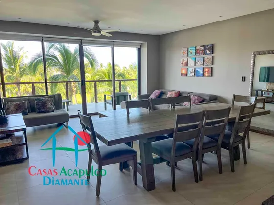Cad La Isla Emerald I4. En Condominio De Playa. Con Terraza Y Vista A Las Áreas Comunes