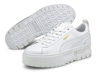 Puma bianche e dorate 2025