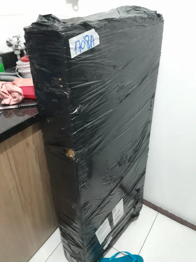 Foto de comprador com bicicleta elétrica no Mercado Livre