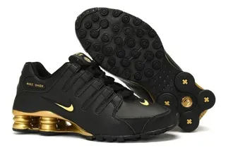 Nike shox negro con dorado online
