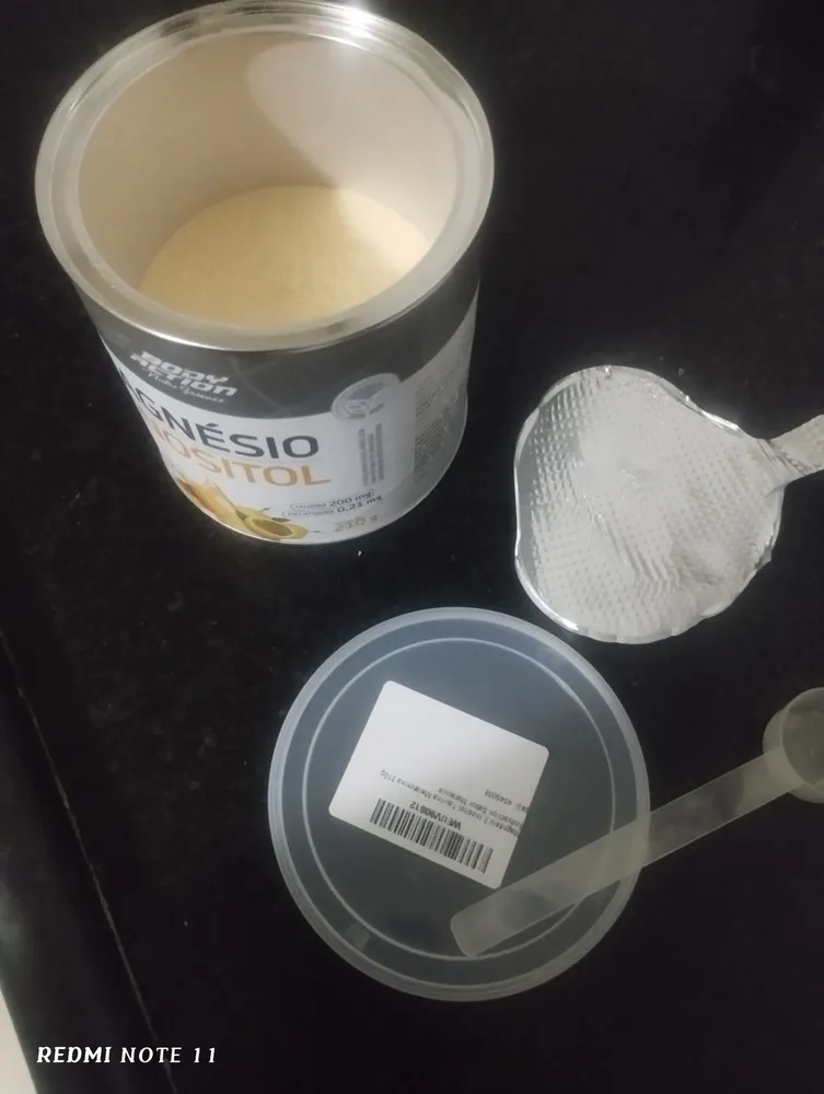 Pó do suplemento com scoop