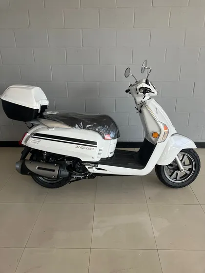 La Moto Incluye Baulera Tipo Top Case