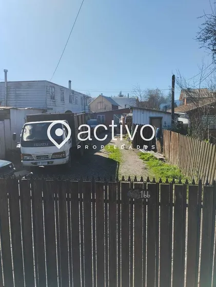 Terreno Con Cabañas En Céntrica Ubicación