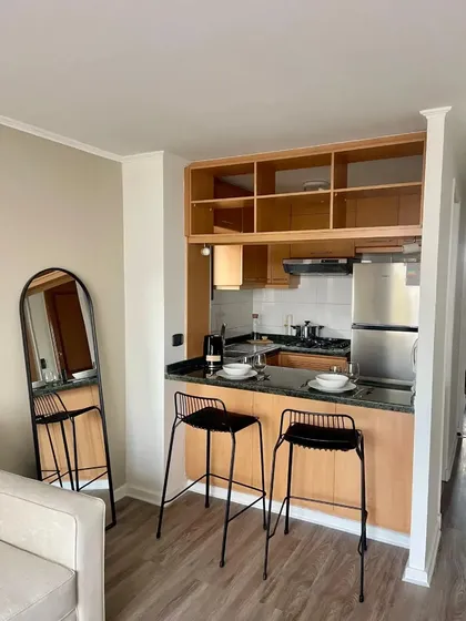 Un Dormitorio Amoblado Con Bodega