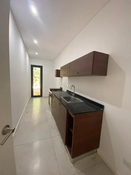 Excelente Departamento En Venta Con Jardin Propio.