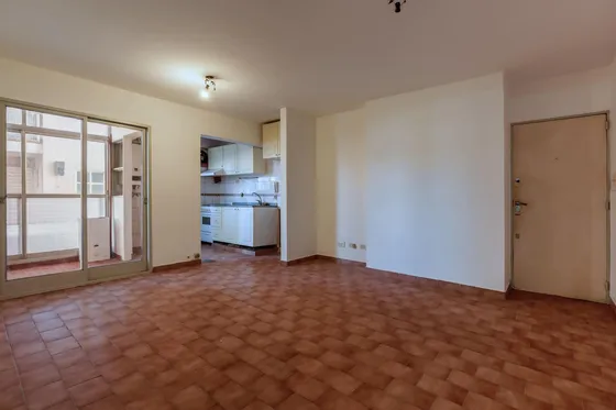 Departamento De Dos Dormitorios + Cochera En  Barrio Martin 