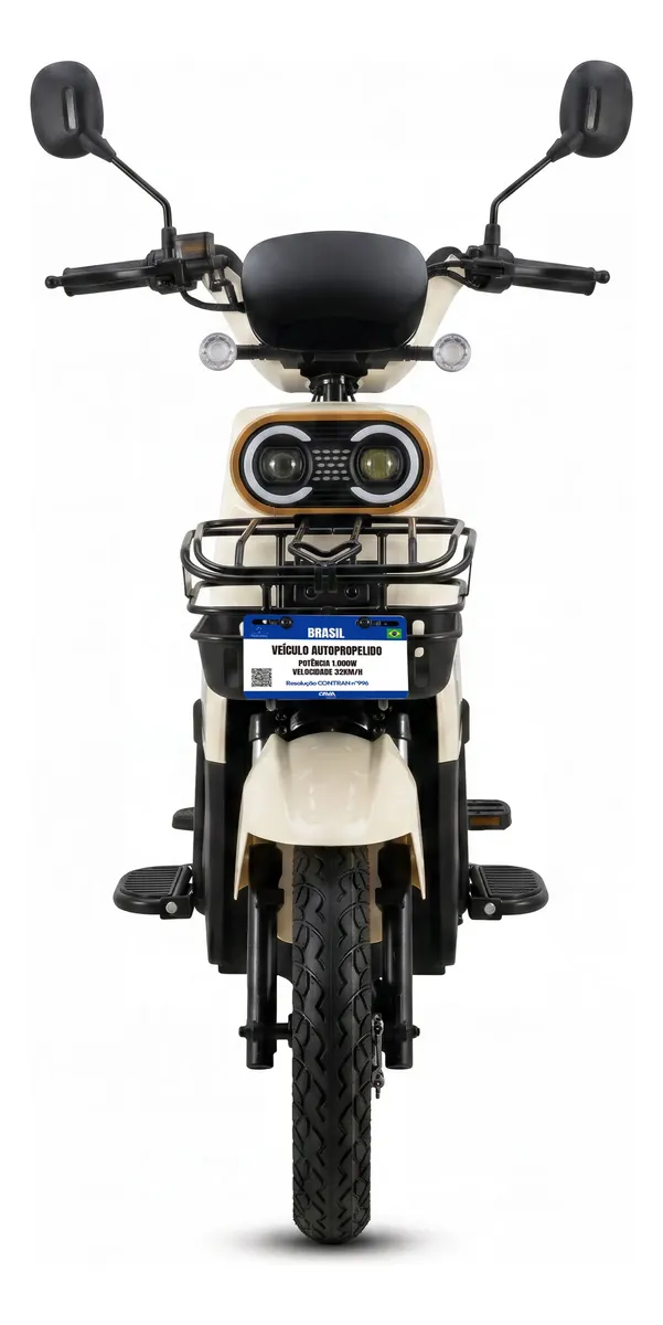 Vista frontal da bicicleta elétrica Cavalletta E3 destacando faróis duplos de LED e cesto frontal
