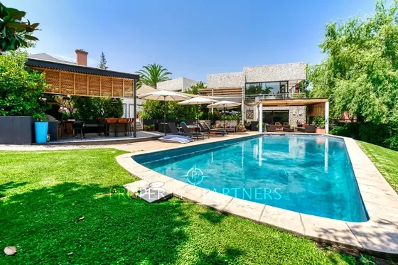 Espectacular Casa En El Huinganal Con Amplio Jardí...