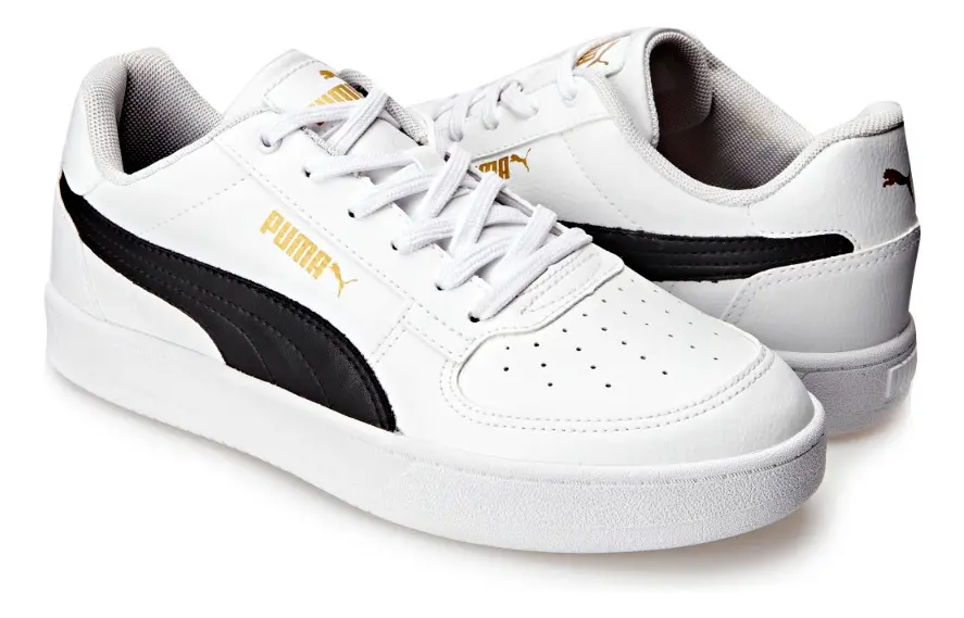 Par de tênis Puma Caven 2.0 posicionados lado a lado em fundo branco