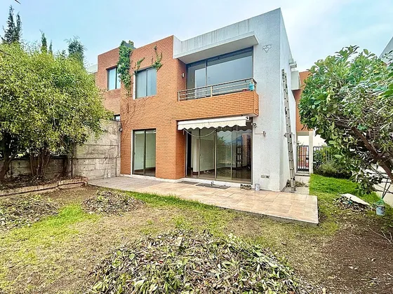 Colegio Huinganal/ Condominio