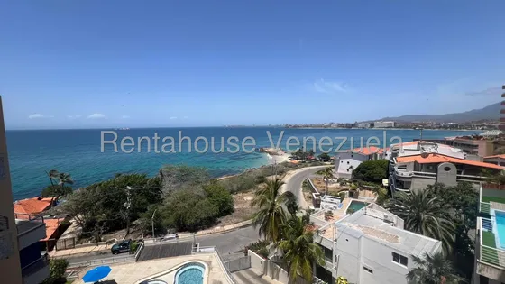 Espectacular Apartamento Remodelado Con Vista Frontal Al Mar En La Bahía De Pampatar. Disfrute De Un Estilo De Vida Exclusivo En Este Impresionante Apartamento En La Caranta. Mas