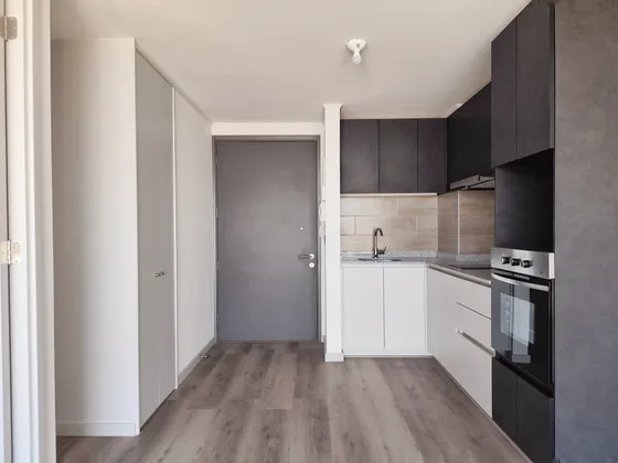 Edificio Av. Vicuña Mackenna (1 Bod.) Vista Poniente Piso 