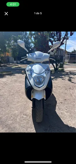 New Elite, 125 Cc. Incluye: Casco Talla L Y Alarma Con Llave