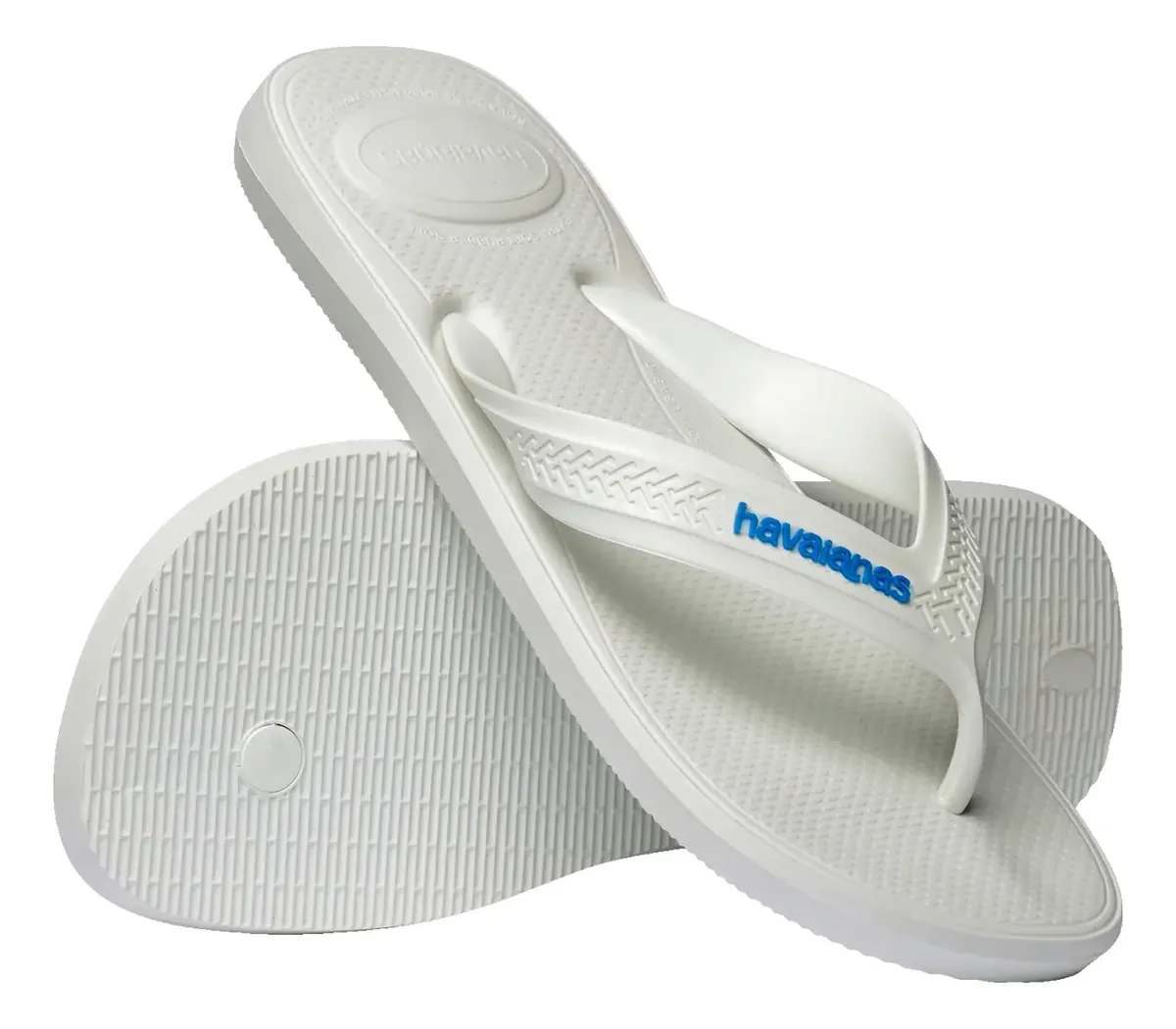 Par de chinelos Havaianas Top Max Comfort brancos com um sobreposto ao outro, mostrando a sola