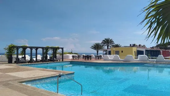 Apartamento En Planta Baja Ubicado En   Residencias Colinas De La Caranta, Pampatar. Con Vista Al Mar Y  A Las Salinas Ic-00366