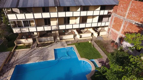 Terreno Con Departamentos Y Casa.  Inversor. 
