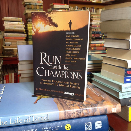 Run With The Champions. Marc Bloom. Ed. Rodale.