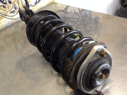 Amortiguador Con Resorte Delantera Der Izq Chevy Oem (c/u)