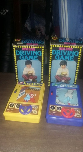 Imagen 1 de 2 de 2 Driving Game Penny Arcade  Made Hong Kong   Cada Uno