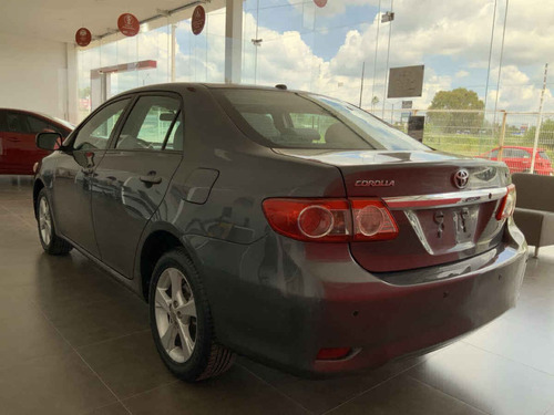 Imagen 2 de 14 de Toyota Corolla 2011 4p Xle Aut W/moonroof A/a Ee Cd R-16 Ab