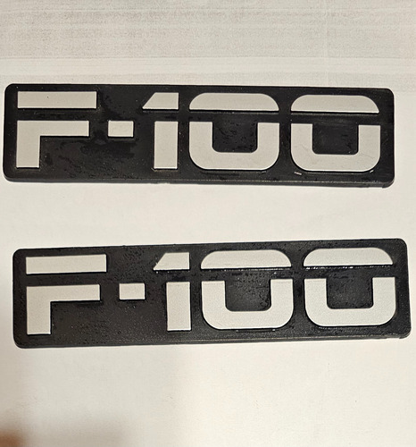 Emblema Guardabarro Delantero F100 Año 92/95. Gris