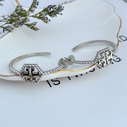 Aretes Tory Burch Arracadaa Logo Hexagonal Texturizado