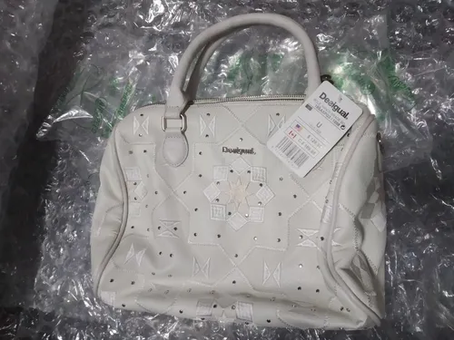 Cartera desigual blanca clearance