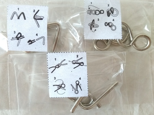 Imagem 3 de 3 de Kit Quebra Cabeça Metal 3d Enigma Com 3 Peças Steel Puzzles