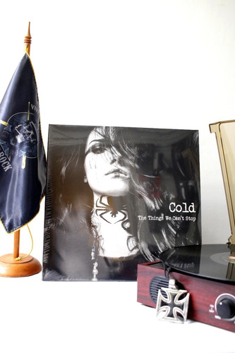Vinilo // Cold // The Thing Whe Can't Stop  // Lucy Rock