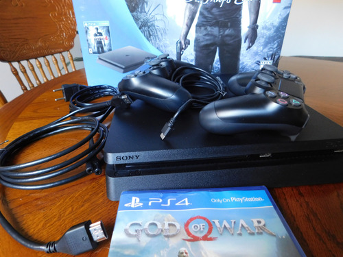 Playstation 4 Slim 500gb + 2 Joysticks + God Of War.