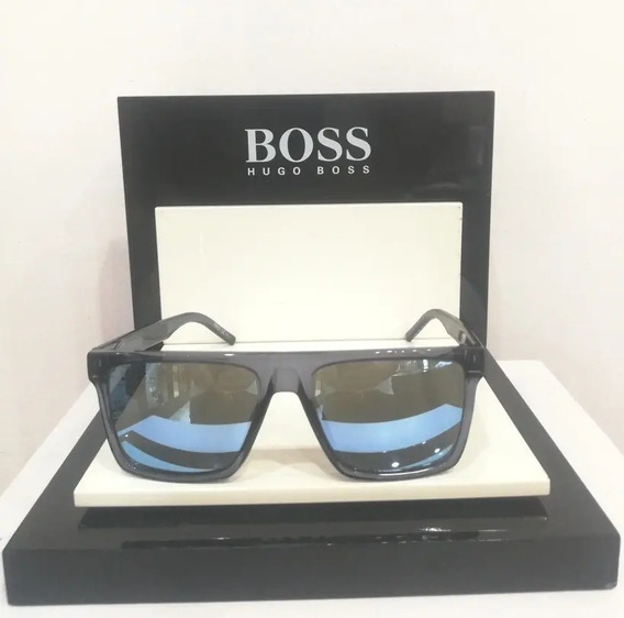 Lente solar Hugo Boss color negro en fibra de carbón modelo 1130/S-03de  piloto