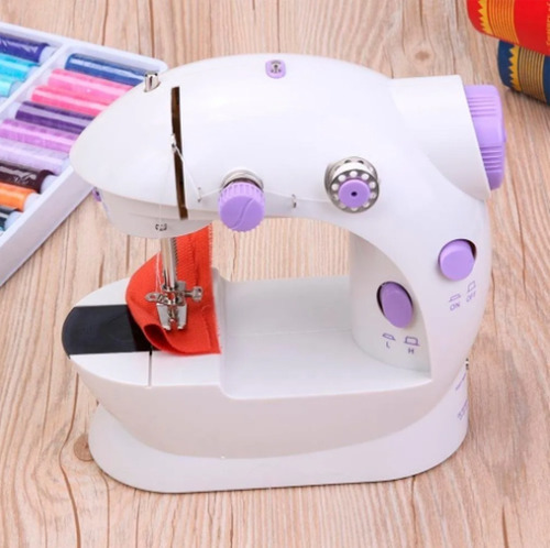 Imagen 6 de 7 de Mini Máquina De Coser Eléctrica Con Luz Incluída En Clicshop