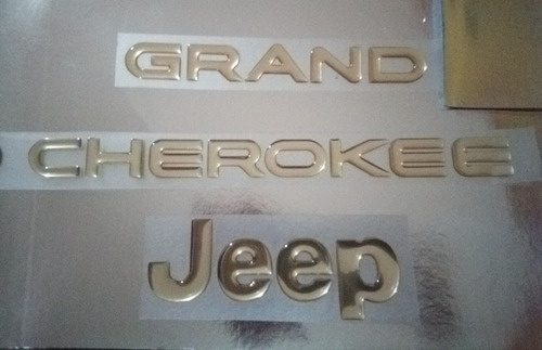Emblema Jeep Grand Cherokee Original Resina 2 Piezas