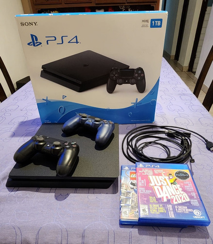 Playstation 4 1tb Color Negro, Incluye 2 Mandos Y 2 Juegos