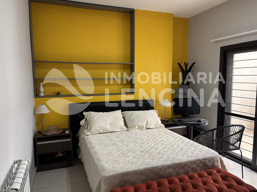 Departamento 2 Dormitorios Con Patio Y Cochera. Centro