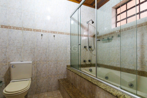 Casa Em Porto Alegre Com 3 Dormitórios - Ot7083
