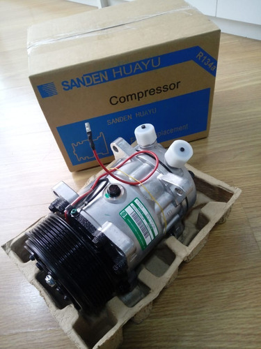 Imagem 1 de 3 de Compressor Ar Cond 7h15 Sanden 24v 8pk Saída Vertical 4762