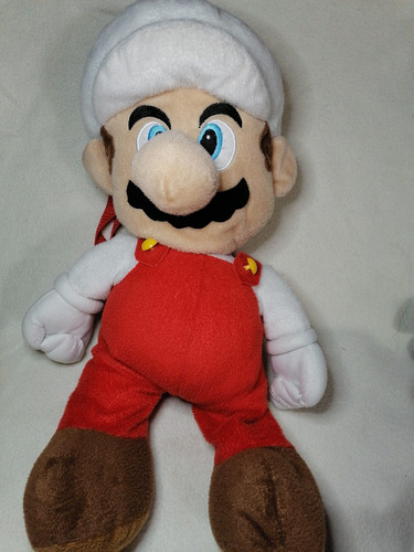 Imagen 2 de 9 de Peluche Mochila Original Mario Fire All Starl Nintendo 50cm.