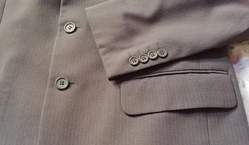 Traje store gris topo