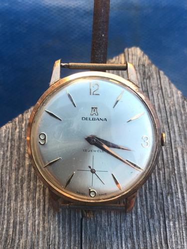 E- Reloj  A Cuerda, Delbana, 17 Rubis, Calibre Landeron 560.