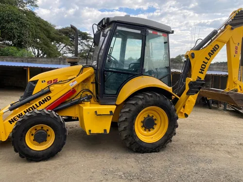 Retro Excavadora New Holland B95b Pajarita