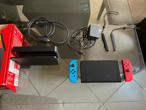 Consola Nintendo Switch Oled Rojo Y Azul Neón (Usado)