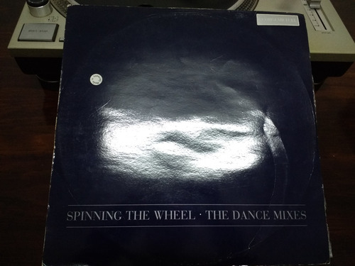 George Michael - Spinning The Wheel Vinilo