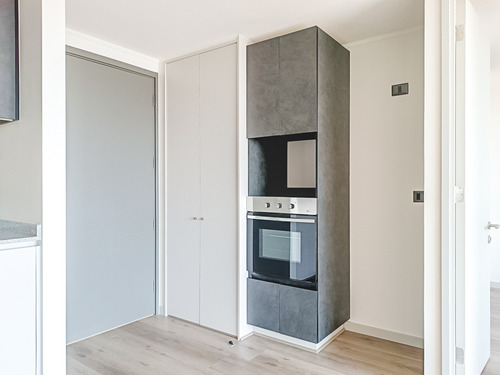 Edificio Av. Vicuña Mackenna (1 Bod.) Vista Poniente Piso